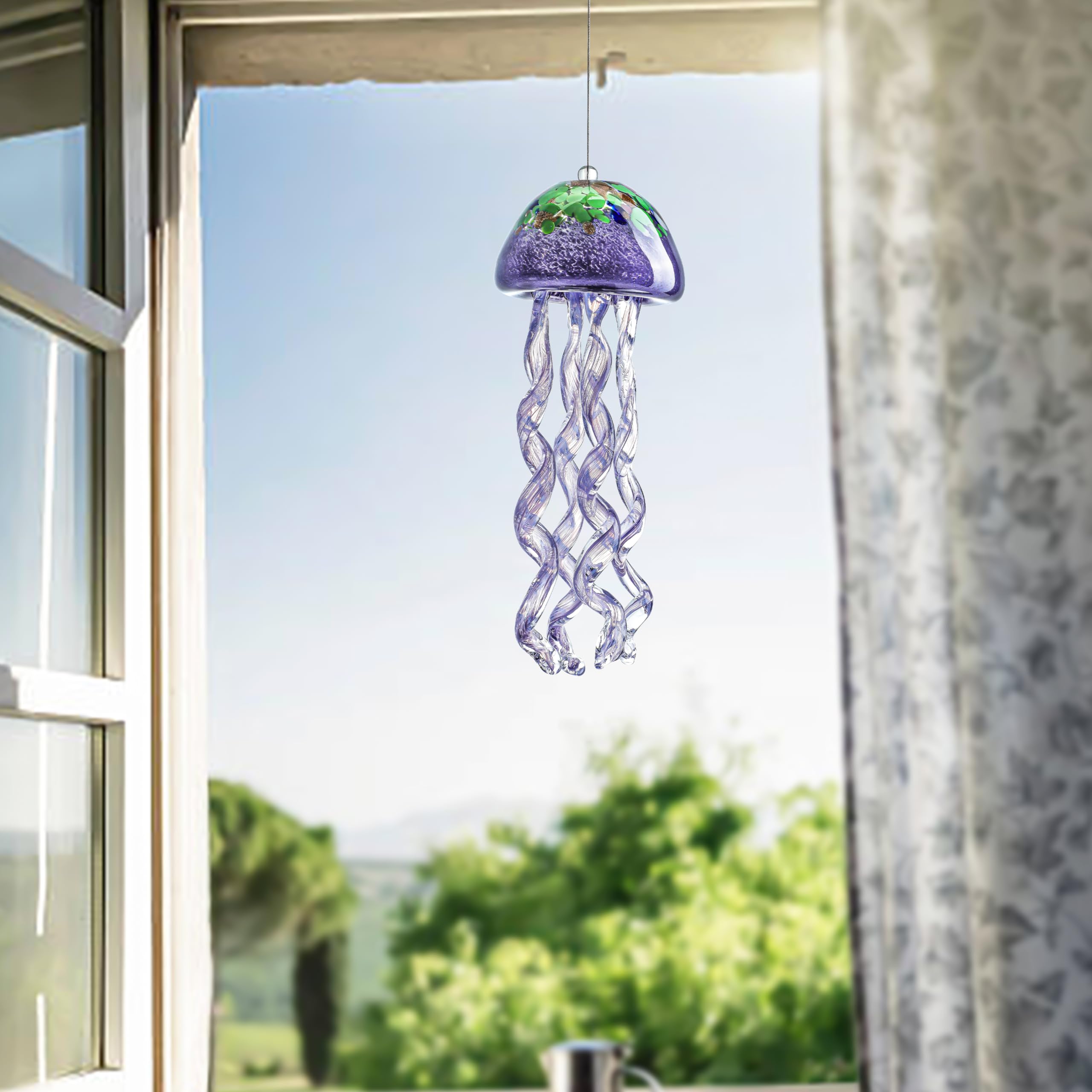 H&D Hyaline and Dora handmade jellyfish décor creates unique artisanal garden accents.