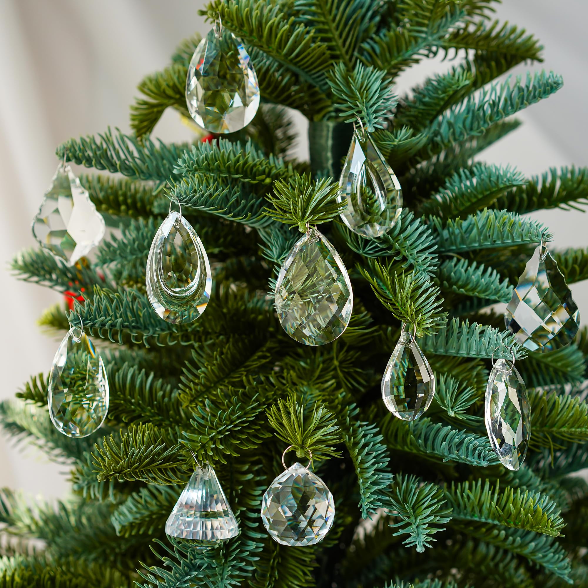 H&D Hyaline and Dora mesh crystal prism creating shimmering wall reflections