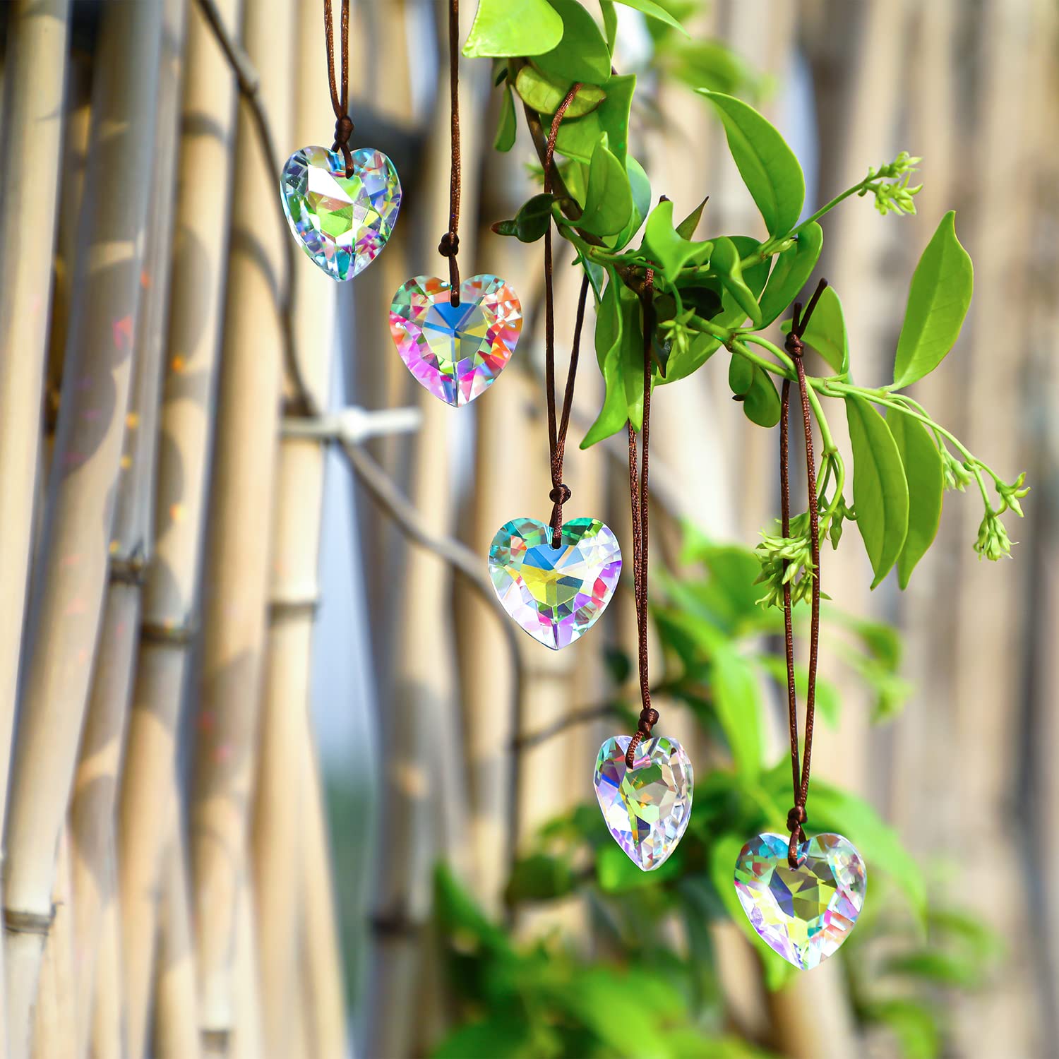 H&D HYALINE & DORA vivid crystal heart hanging as window decor for weddings.
