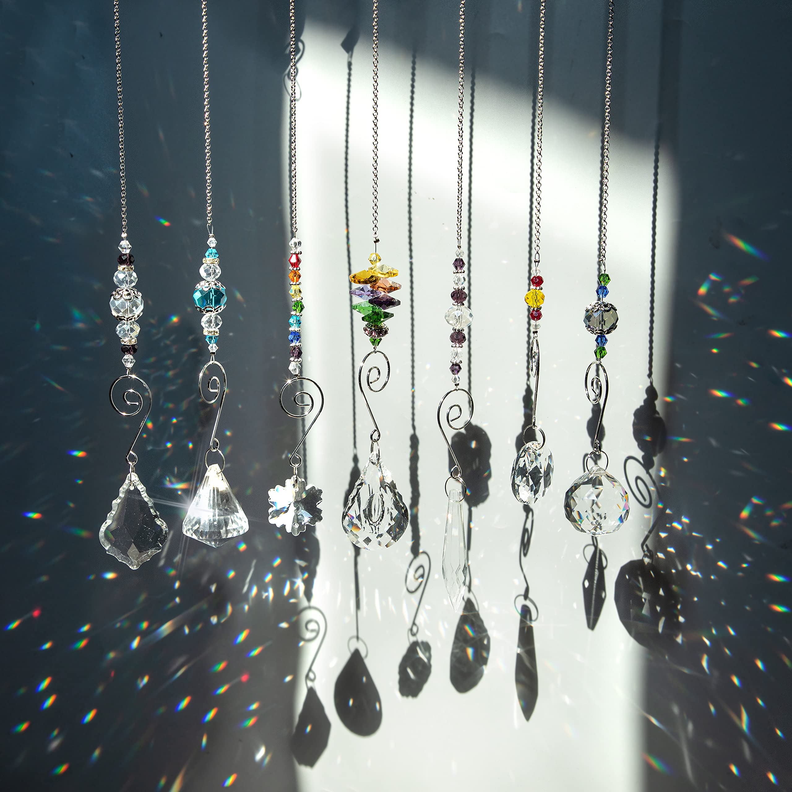 HD Hyaline & Dora Set 7 crystal rainbow suncatcher hangs by window with rainbow refractions