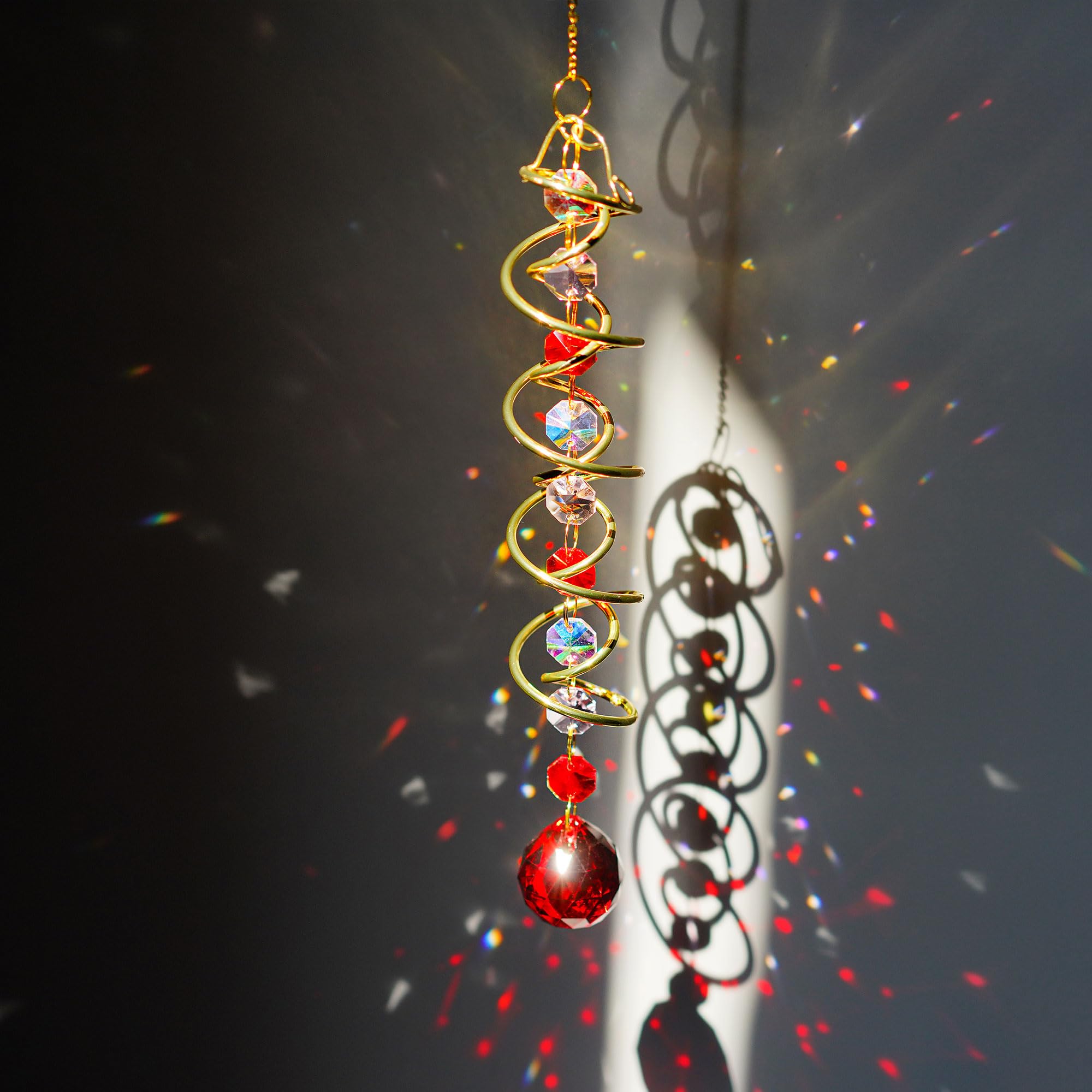 H&D HYALINE & DORA spiral tail adds kinetic charm to sunlit windows