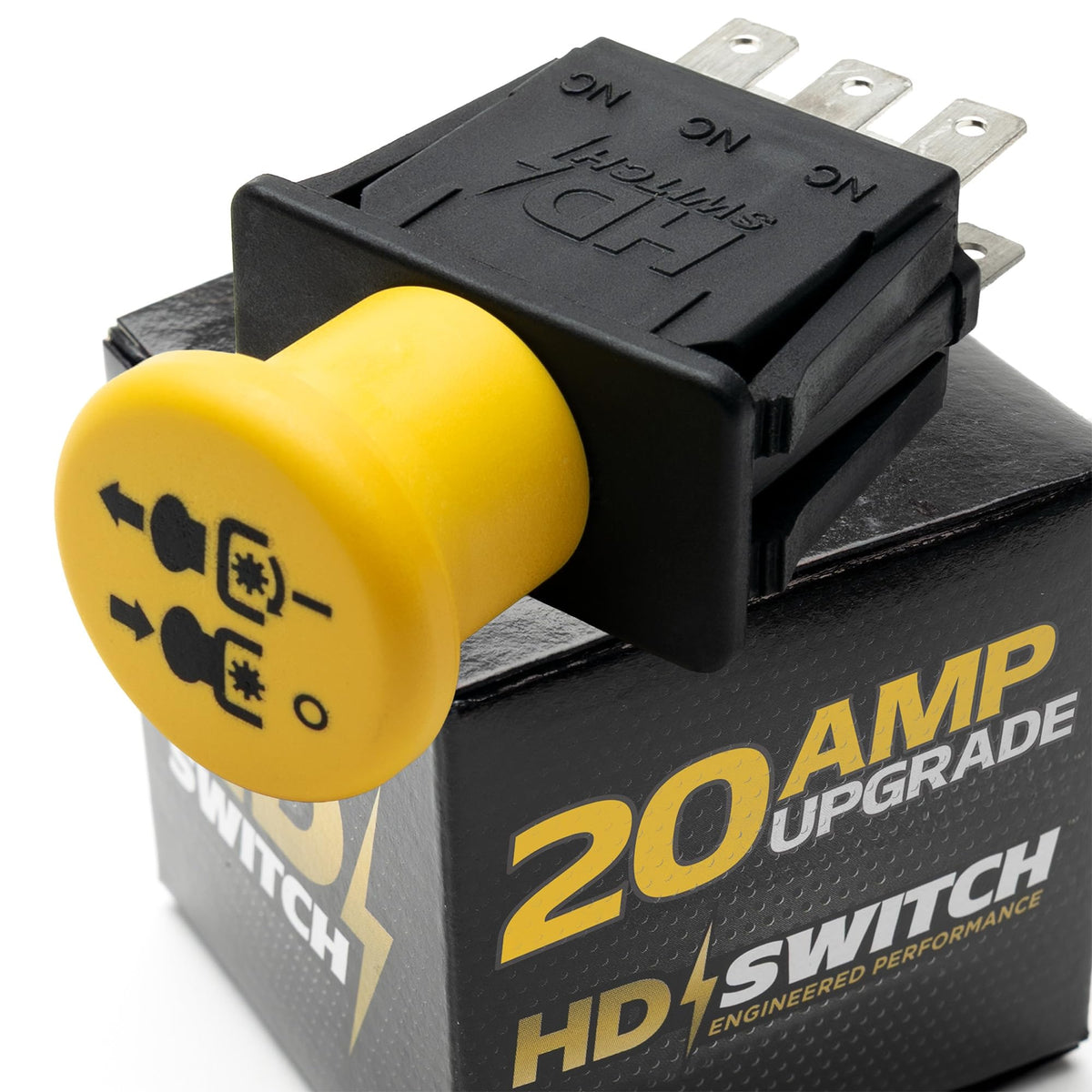 HD Switch 20A PTO switch on Exmark mower panel, rugged for demanding mowing tasks.