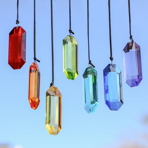 HDCRYSTALGIFTS crystal prisms in window create soft rainbow accents