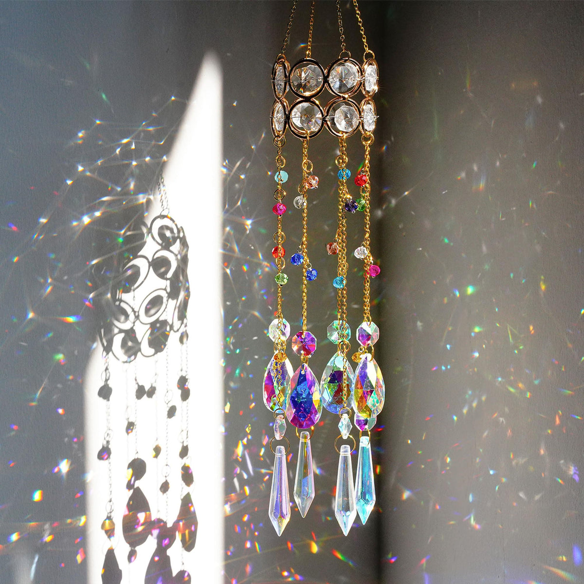 HDCRYSTALGIFTS 14.5-inch crystal suncatcher with beads creating rainbows in sunlight