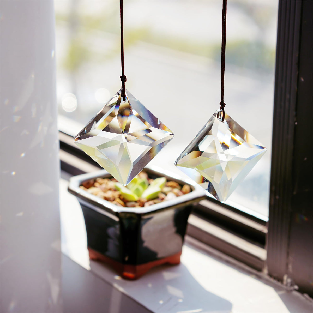 HDCRYSTALGIFTS 50mm clear crystal sun catcher prism catching sunlight to reveal vivid rainbows