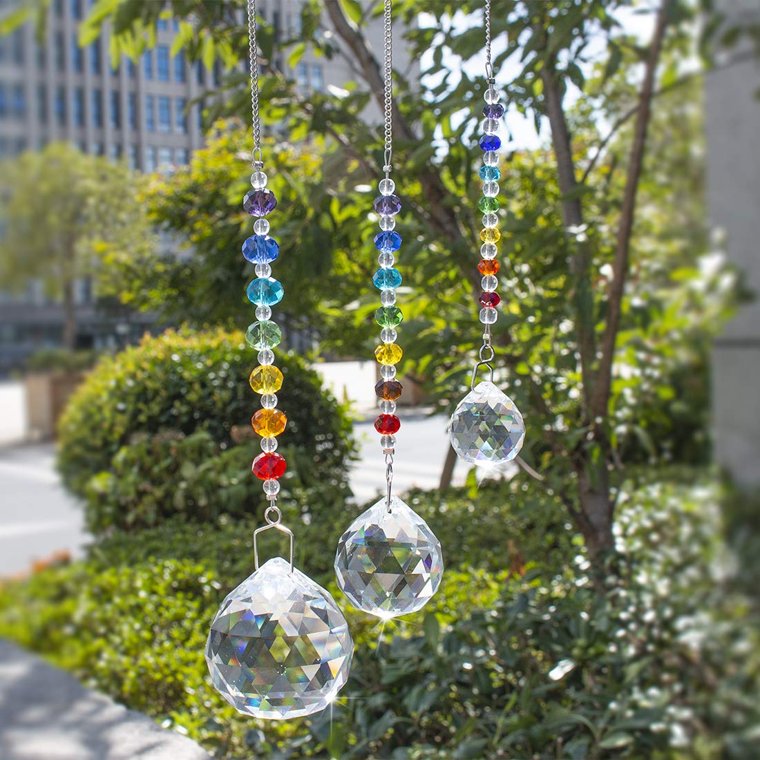 HDCRYSTALGIFTS crystal ball pendant rainbow 2 illuminates walls with colorful reflections.