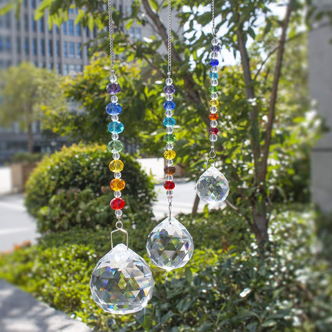 HDCRYSTALGIFTS crystal ball pendant rainbow 2 illuminates walls with colorful reflections.