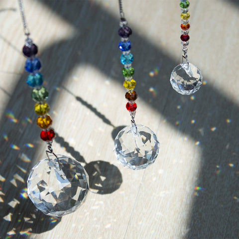 HDCRYSTALGIFTS crystal ball pendant rainbow 3 enhances mood with light play.