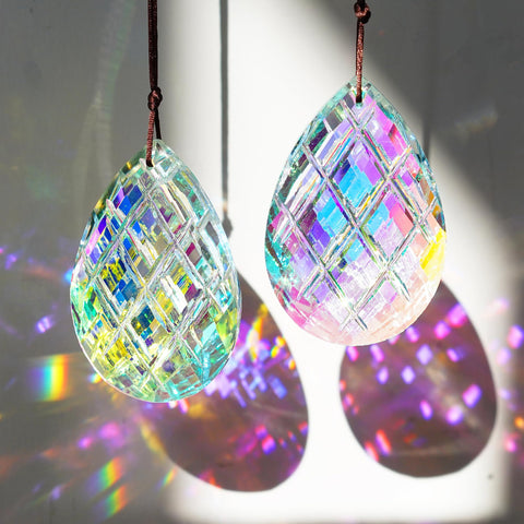 HDCRYSTALGIFTS crystal sun catcher in AB rainbow finish brightens windows with dancing light.