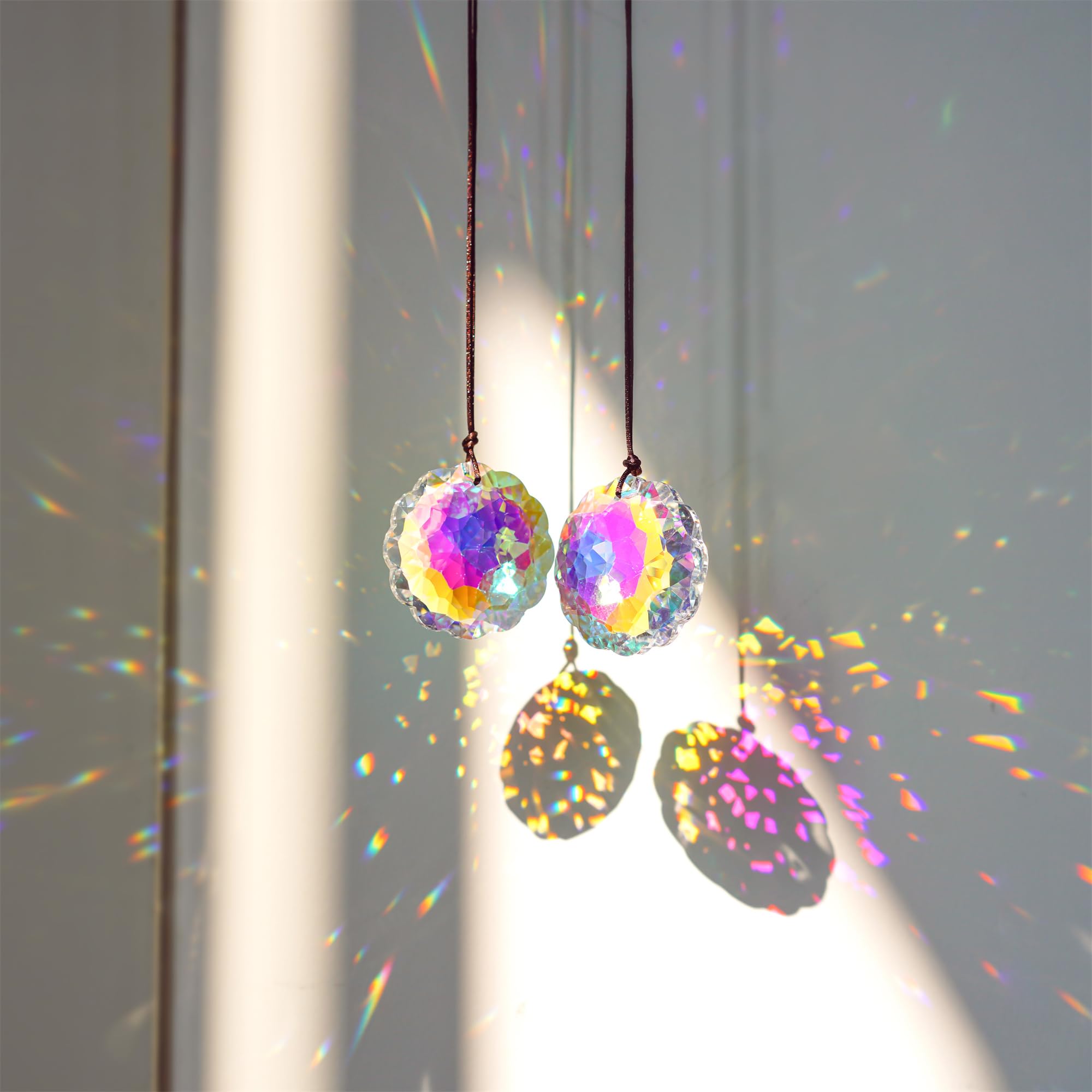 HDCRYSTALGIFTS Datura suncatcher 45mm close-up highlighting crystal facets.