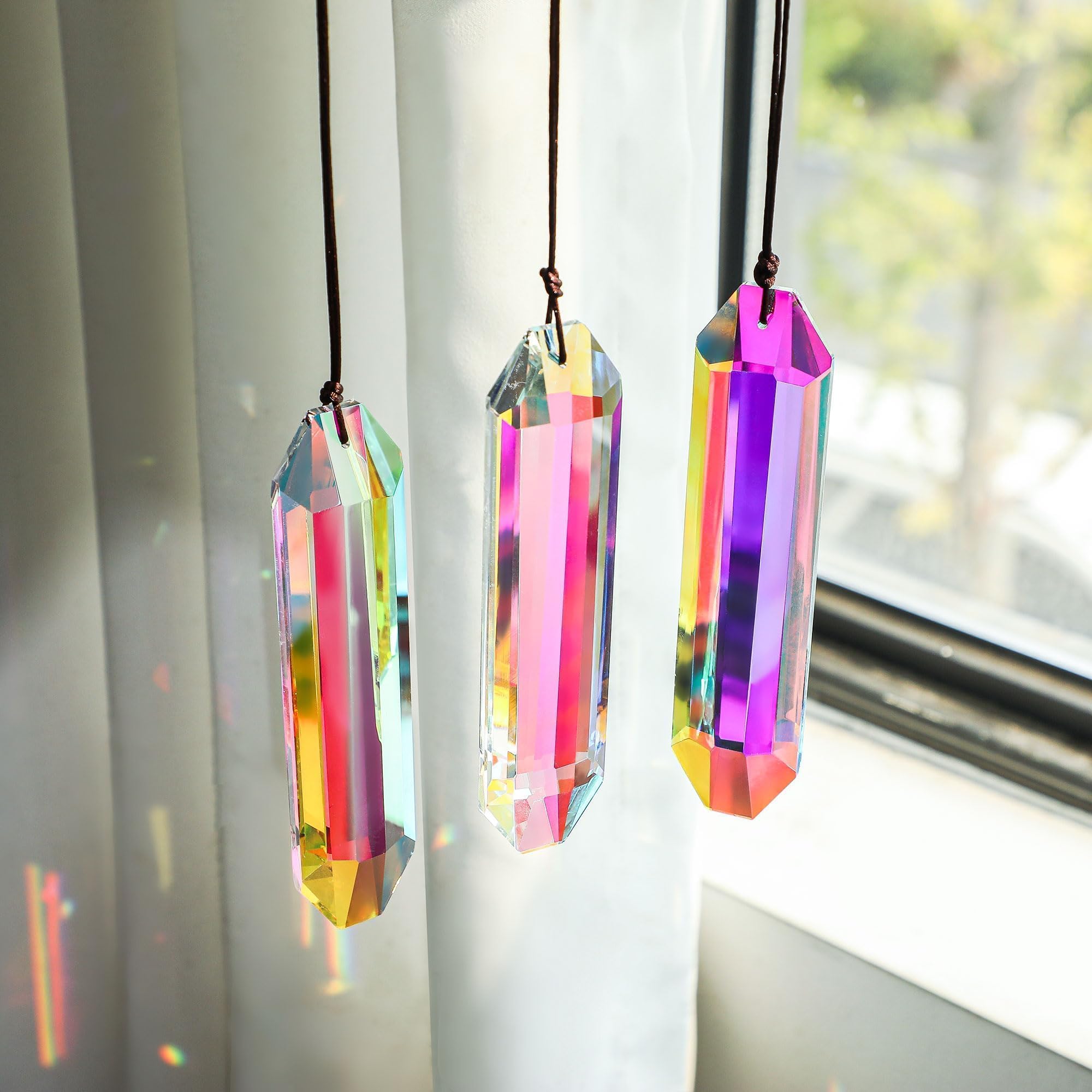 HDCRYSTALGIFTS elegant garden and Christmas tree decor with rainbows.