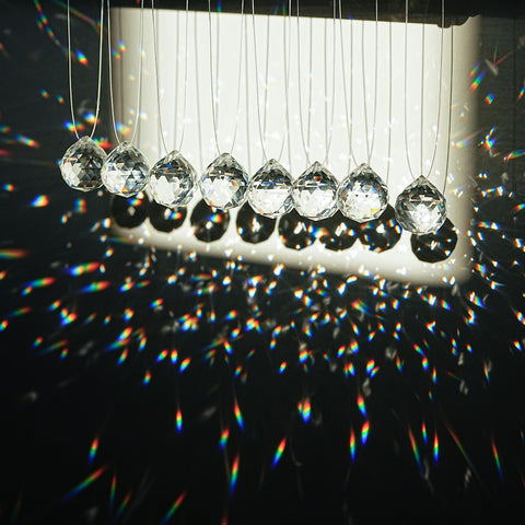 HDCRYSTALGIFTS K9 crystal prisms add sparkle to windows and displays.