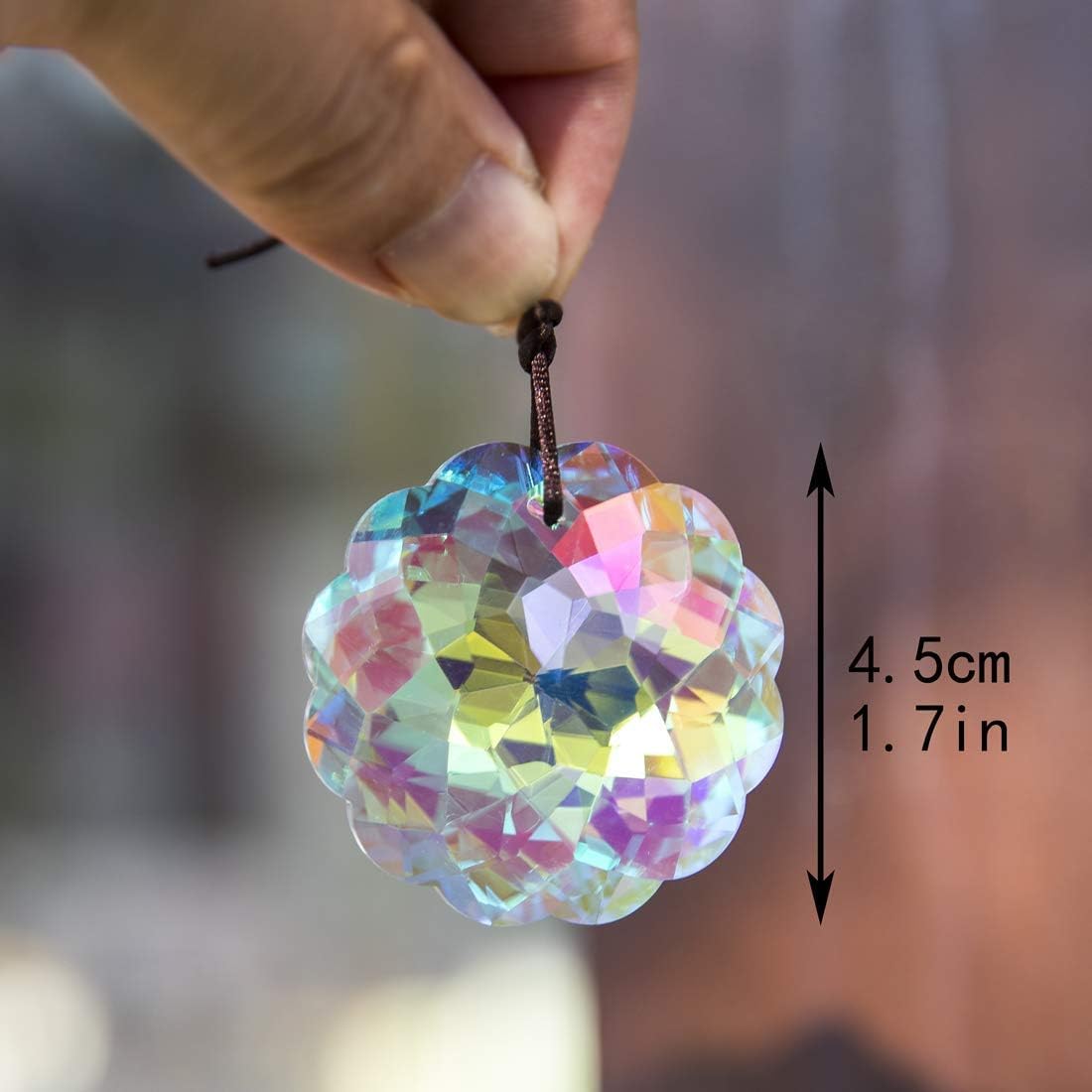 HDCRYSTALGIFTS Rainbow prism catching sunlight to brighten walls and shelves.