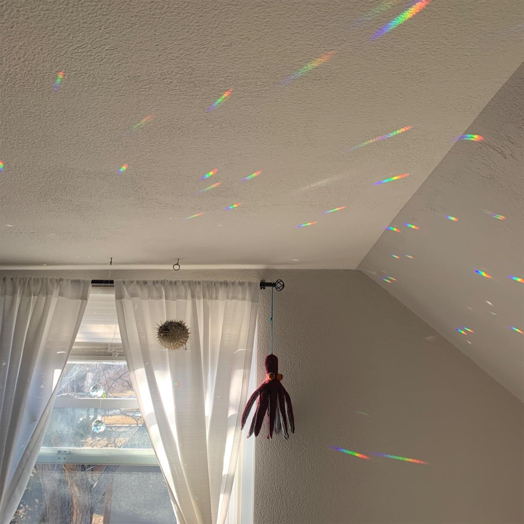 HDCRYSTALGIFTS sun light reflection rainbow effect on bright sunny days.