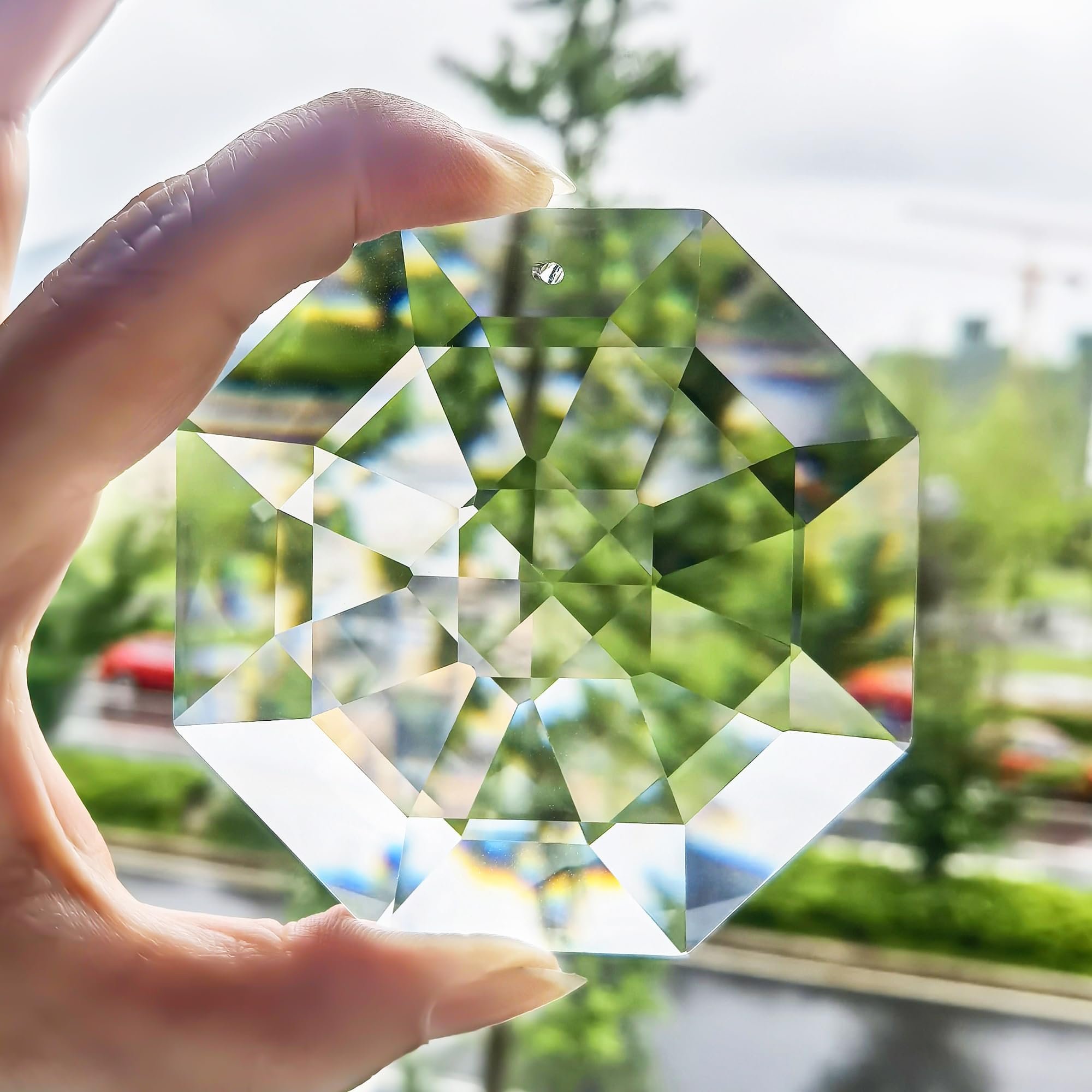 HDCRYSTALGIFTS window rainbow reflections create magical light displays in sunlight.