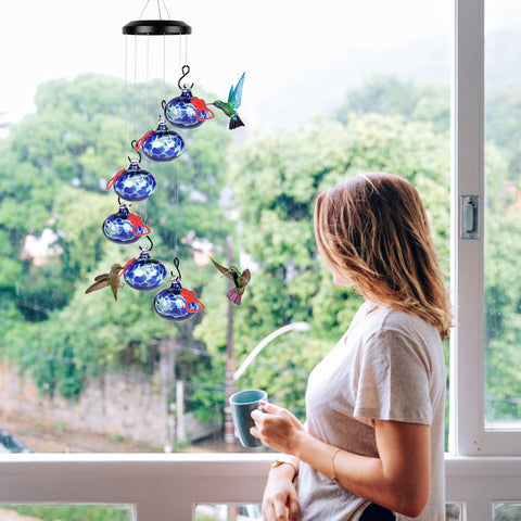 Headak Life multi-port feeder lets several hummingbirds feed at once outside.