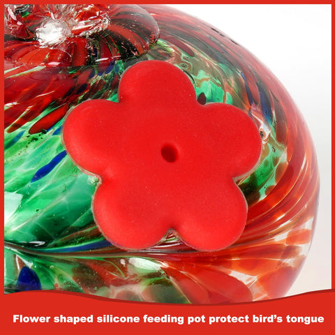 Headak Life red silicone flowers on the feeder attract hummingbirds for quick visits.