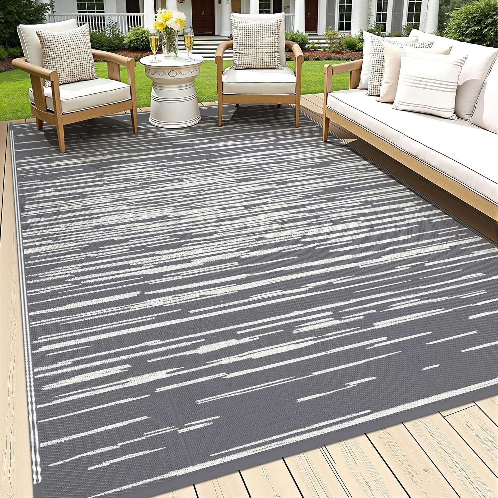 HEBE Outdoor Rug 5x8 waterproof material, easy to rinse after muddy outdoor use.