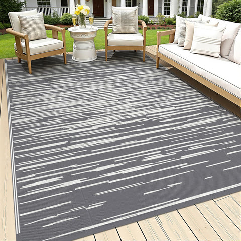 HEBE Outdoor Rug 5x8 waterproof material, easy to rinse after muddy outdoor use.