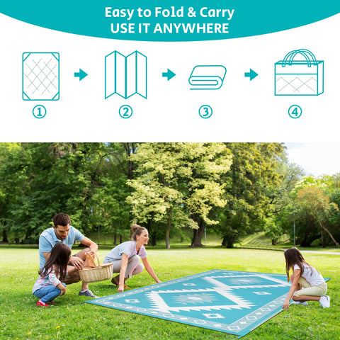 HEBE outdoor mat with corner-loops stays securely in place on windy days.