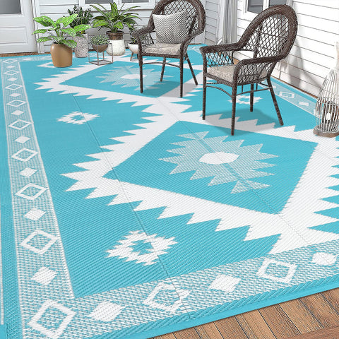 HEBE large 8x10 rug creates a defined outdoor living area.