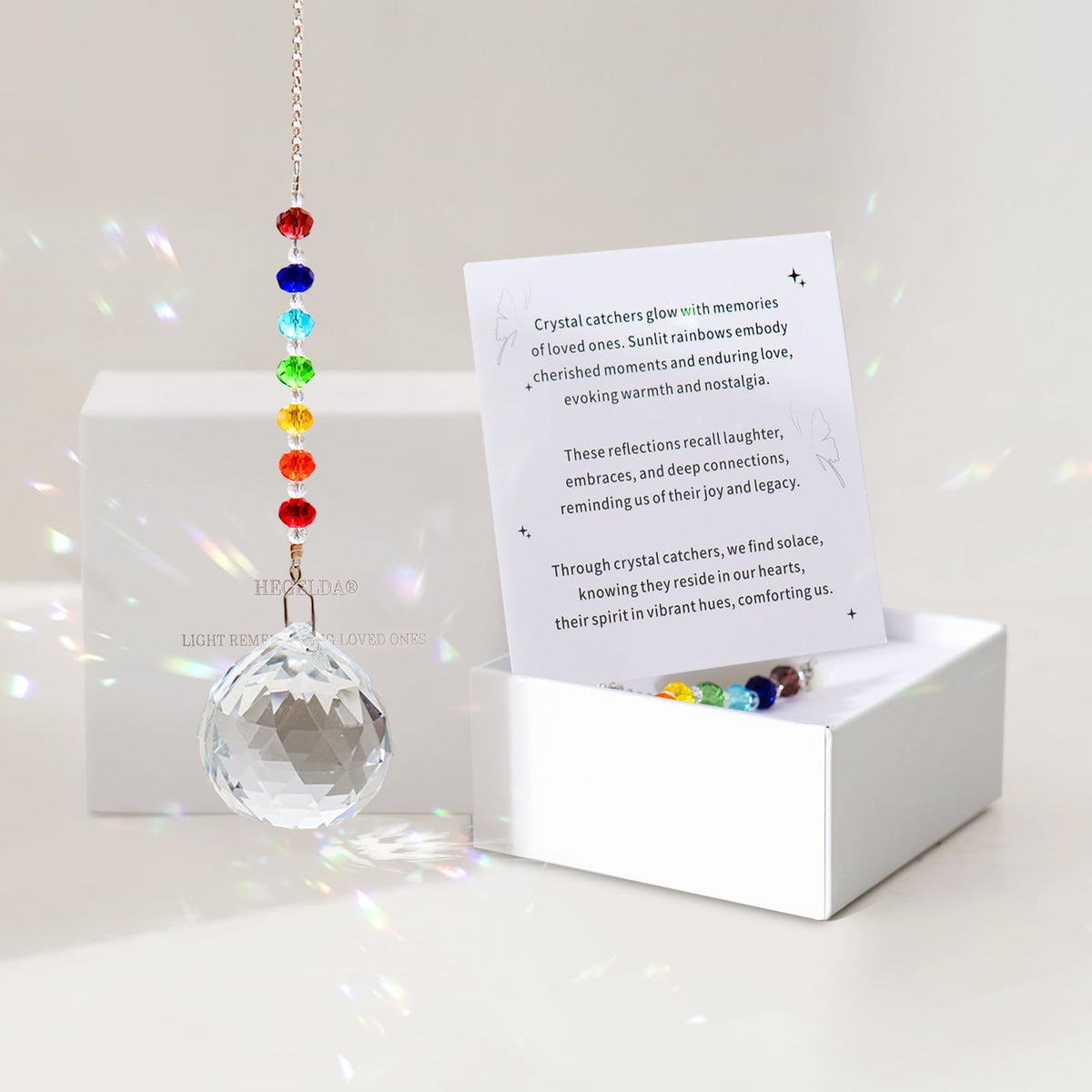 HEGELDA Crystal Sun Catcher memorial design catching morning light for cherished memories.