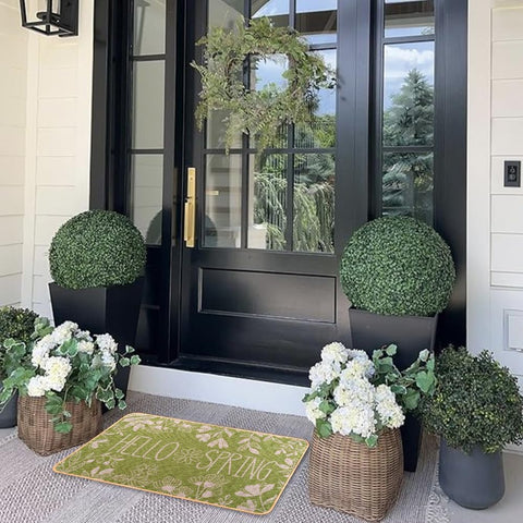 Heirloom Haven Hello Spring door mat suited for indoor and outdoor porches, soaking up dirt.