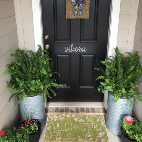 Heirloom Haven Hello Spring door mat close-up showing non-slip back for safe footing.