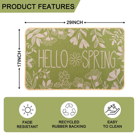 Heirloom Haven Hello Spring door mat in green emphasizes plant-inspired design for refreshed entryways.