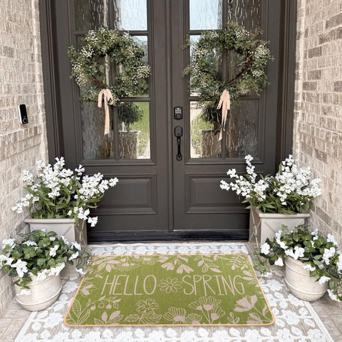 Heirloom Haven Hello Spring door mat fits 29x17 inch entryways with a slim profile.