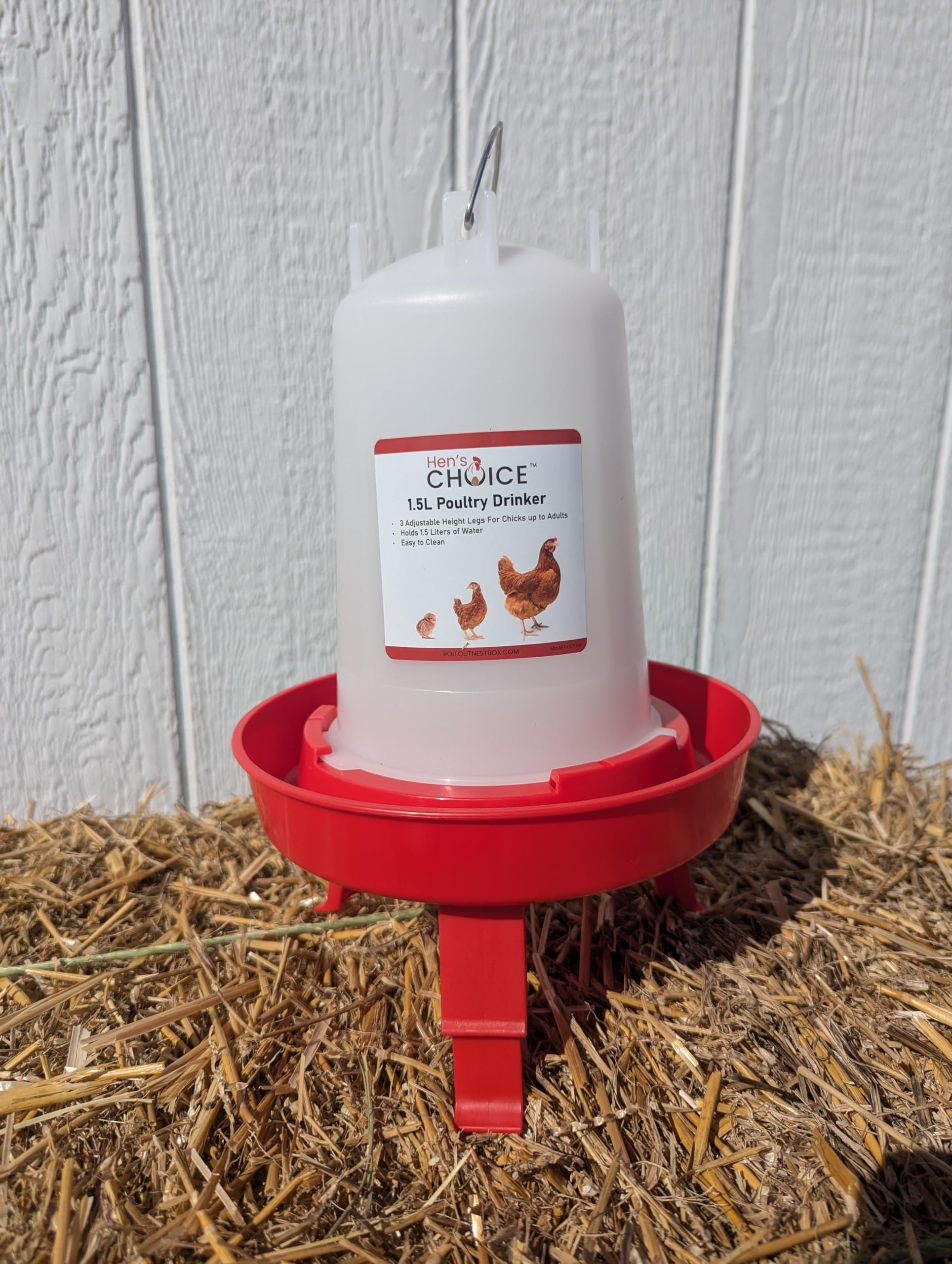 Hen's Choice hangable feeder and drinker simplify transport and positioning.