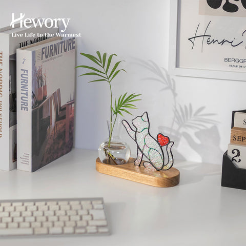 Hewory bulb vase with wooden stand for compact desk propagation.