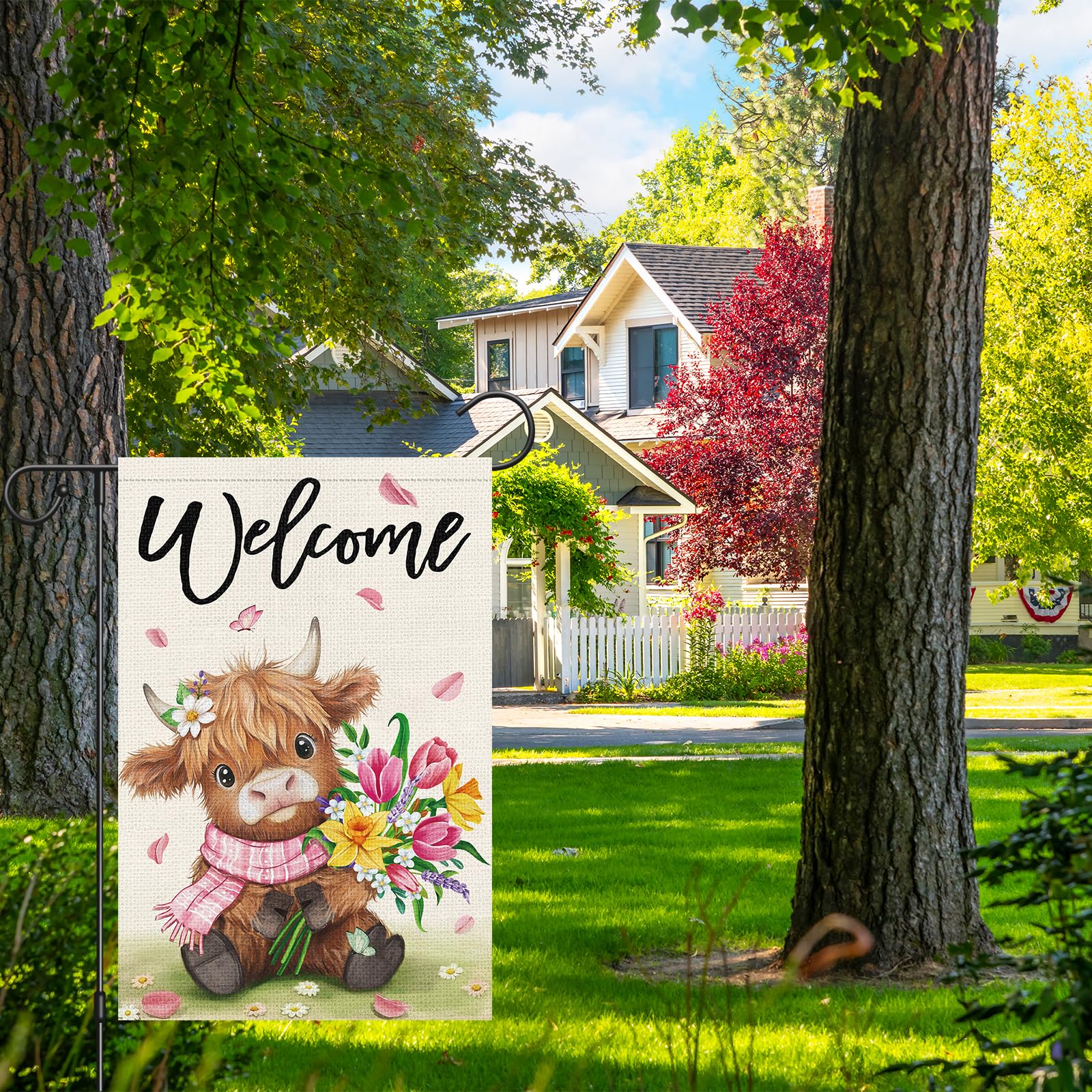 Heyfibro Highland Cow Bouquet Flag features a fluffy cow with flowers.