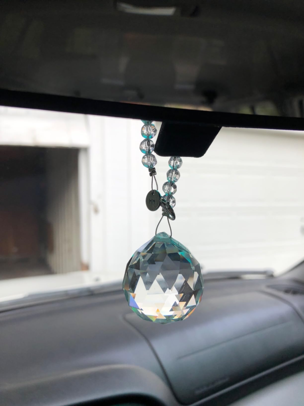 Hidden Hollow Beads lotus charm adds handcrafted touch to crystal decor