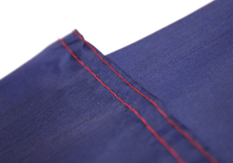 High Supply Dominican flag in sunlit outdoor setting showcases colorfast fabric