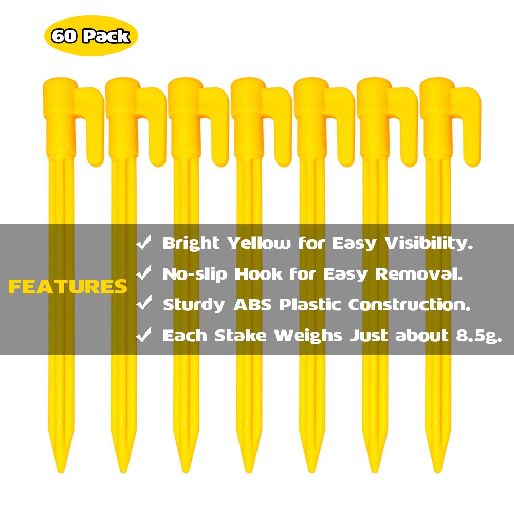 Hikemax bright-yellow stakes on grass improve visibility for quick anchoring.