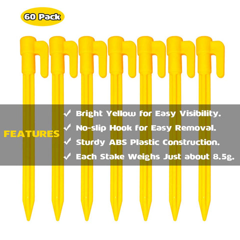 Hikemax bright-yellow stakes on grass improve visibility for quick anchoring.