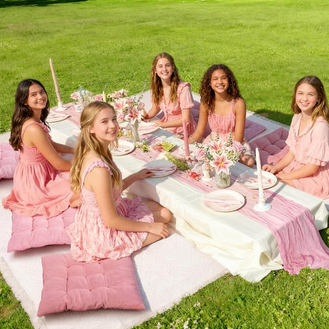 Hillsuren backyard picnic setup showing coordinated decor in pink.