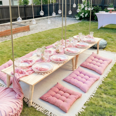 Hillsuren pink picnic pillow ready for comfortable seating.