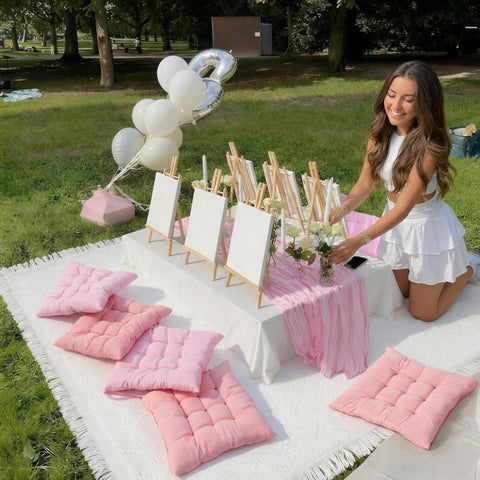 Hillsuren pink blanket drape demonstrates full coverage on lawn seating.