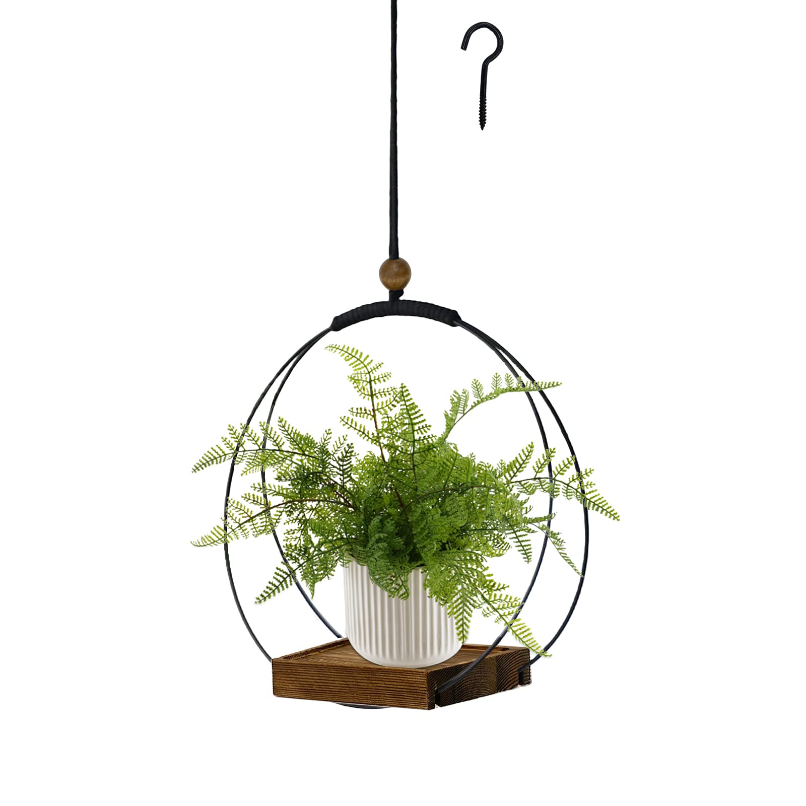 Hismocal hanging planter on wall with black base adds chic indoor decor.