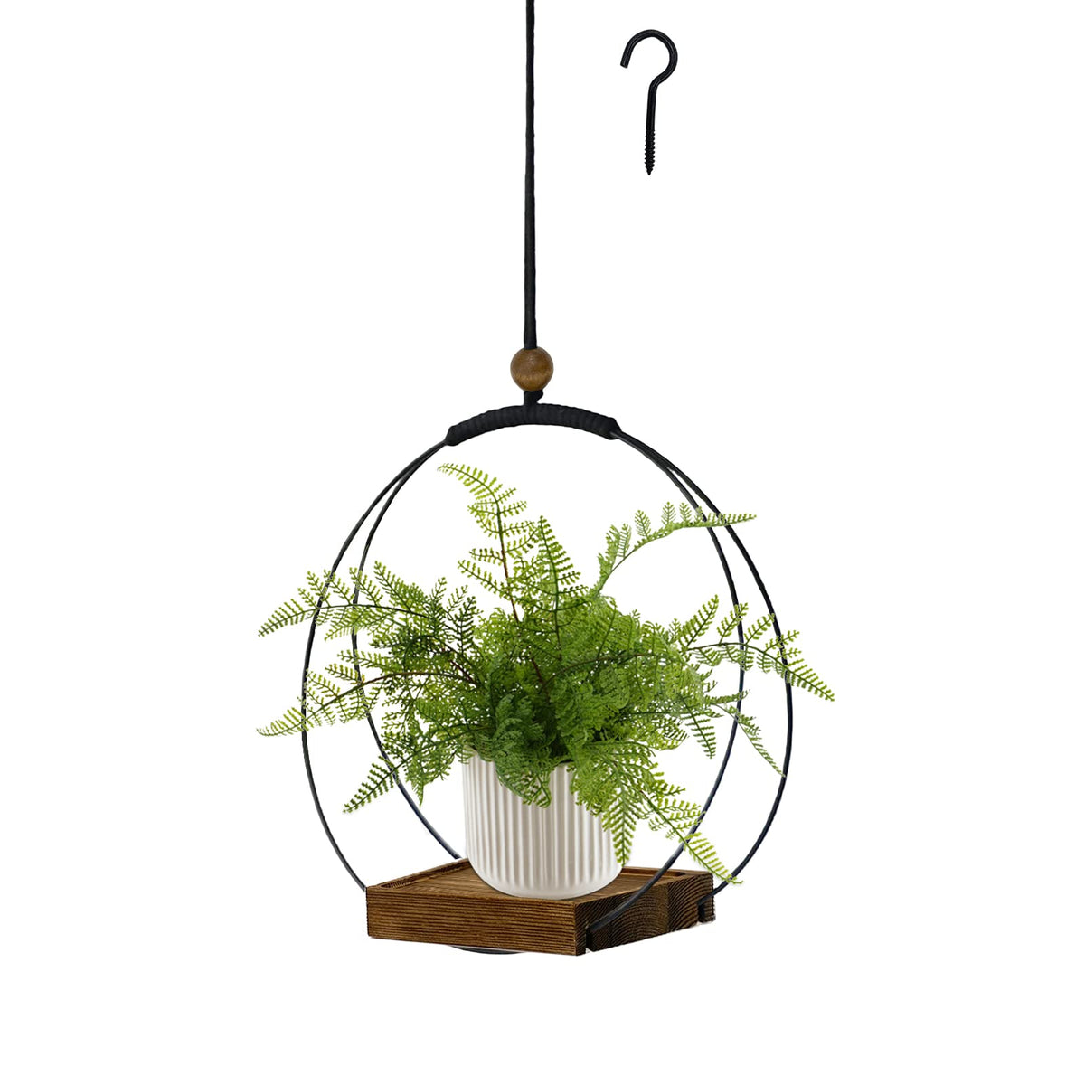 Hismocal hanging planter on wall with black base adds chic indoor decor.
