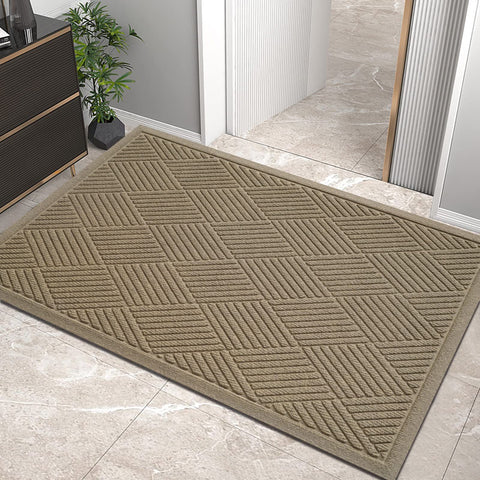 HIYARD sturdy front door mat with absorbent fibers traps moisture and dirt.