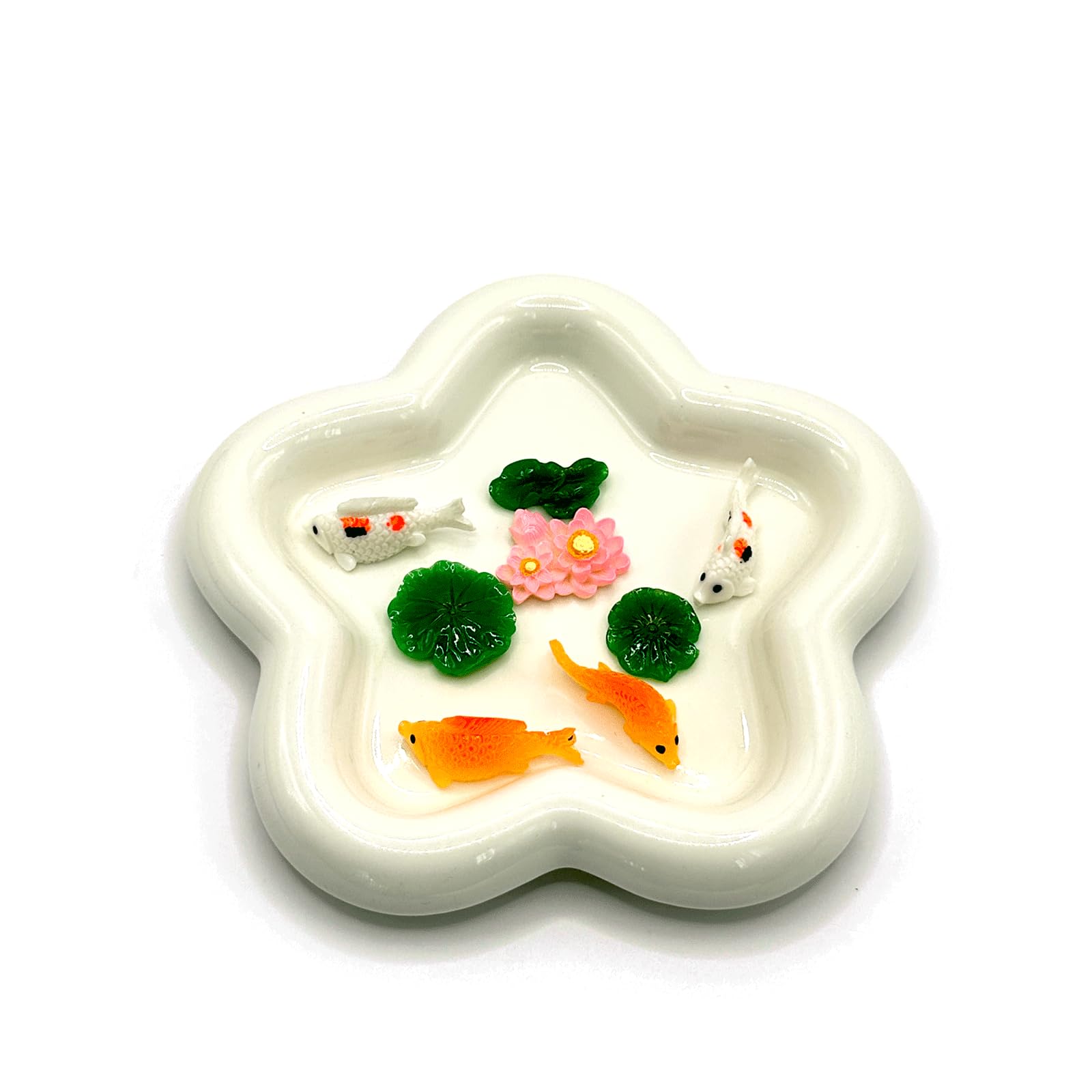 HIZEMLK white koi provides charming contrast for miniature lakes.
