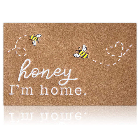 HLFMVWE Bee door mat in brown welcomes guests and absorbs moisture.