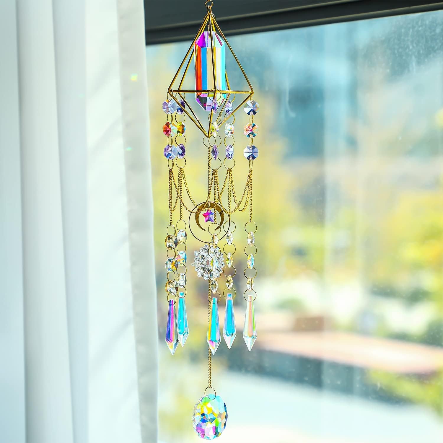 H&D Crystal Drop Prism catches sun and scatters rainbow light.