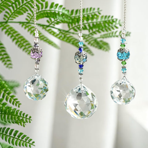 H&D HYALINE & DORA chandelier prism detail highlighting ambient sparkle