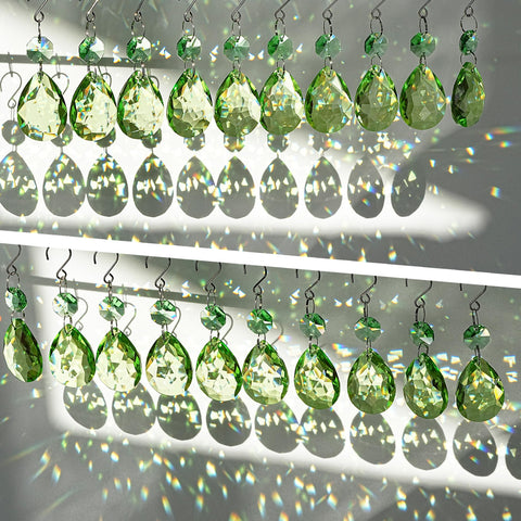 H&D Hyaline & Dora octagonal green crystal bead sparkles on display.