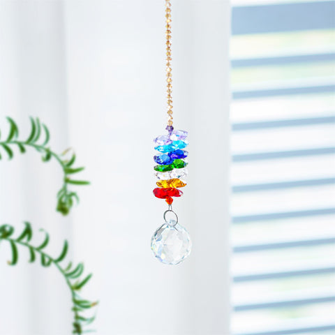 H&D Hyaline & Dora rainbow prism facet scatters light across walls.