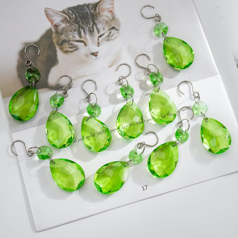 H&D Hyaline & Dora sun catcher green pendant hangs elegantly.